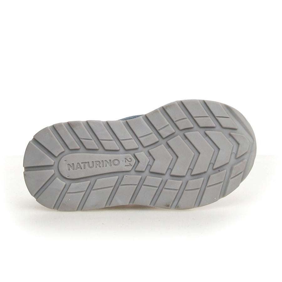 Gray sole of a shoe with 'Naturino' branding on a white background